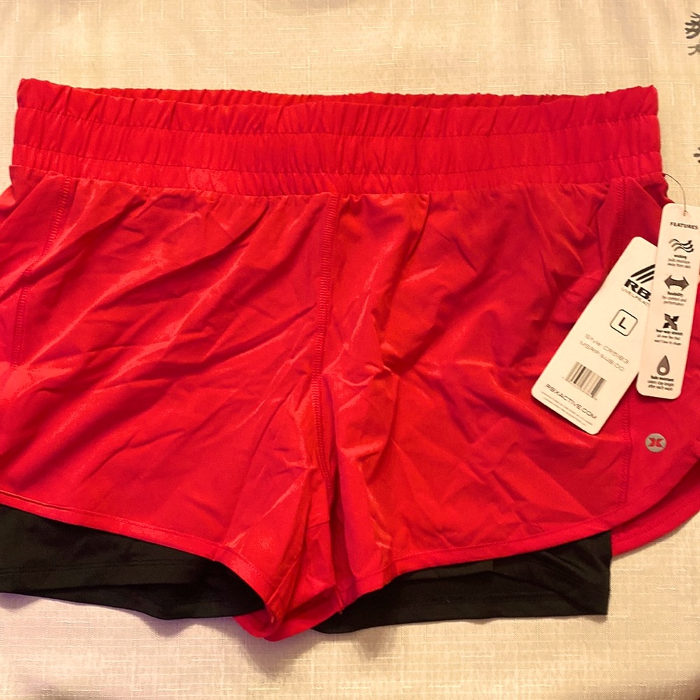 NWT hot pink shorts with built in spandex by RBX, women’s L